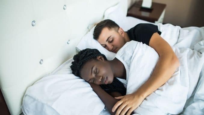 couple-sleeping-together